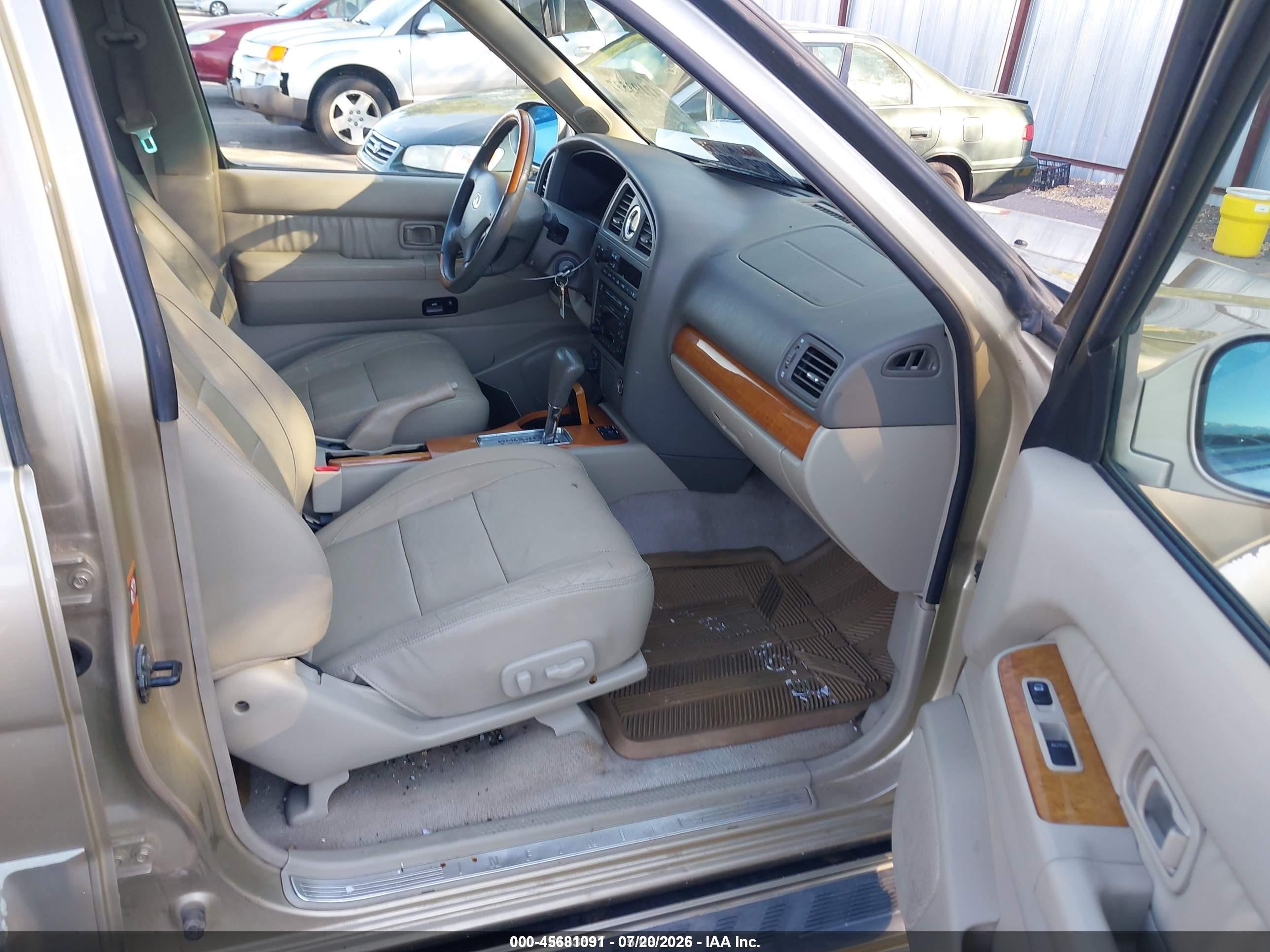 2002 Infiniti Qx4 Luxury Gold vin: JNRDR09Y52W262077