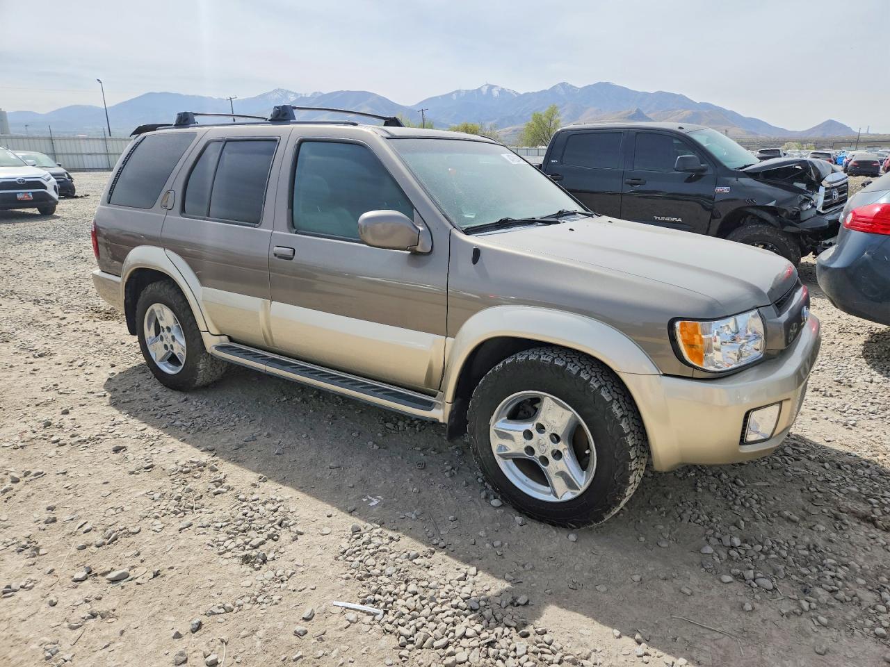 2002 Infiniti Qx4 Base Tan vin: JNRDR09Y62W262878