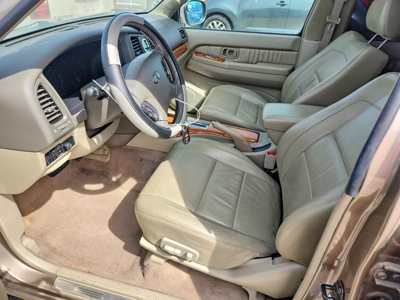 2002 Infiniti Qx4 Base Tan vin: JNRDR09Y62W262878