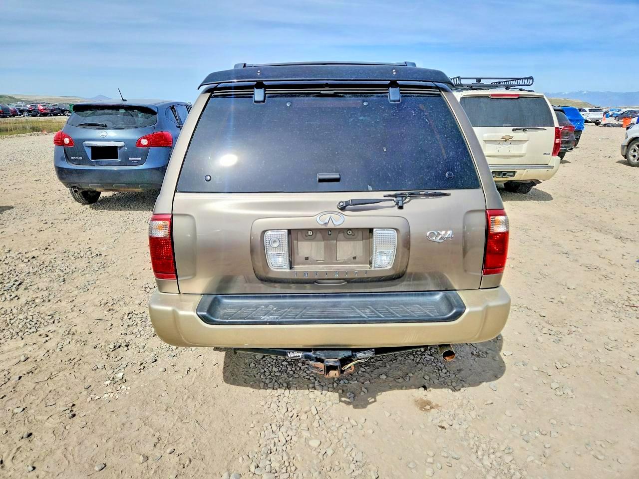 2002 Infiniti Qx4 Base Tan vin: JNRDR09Y62W262878