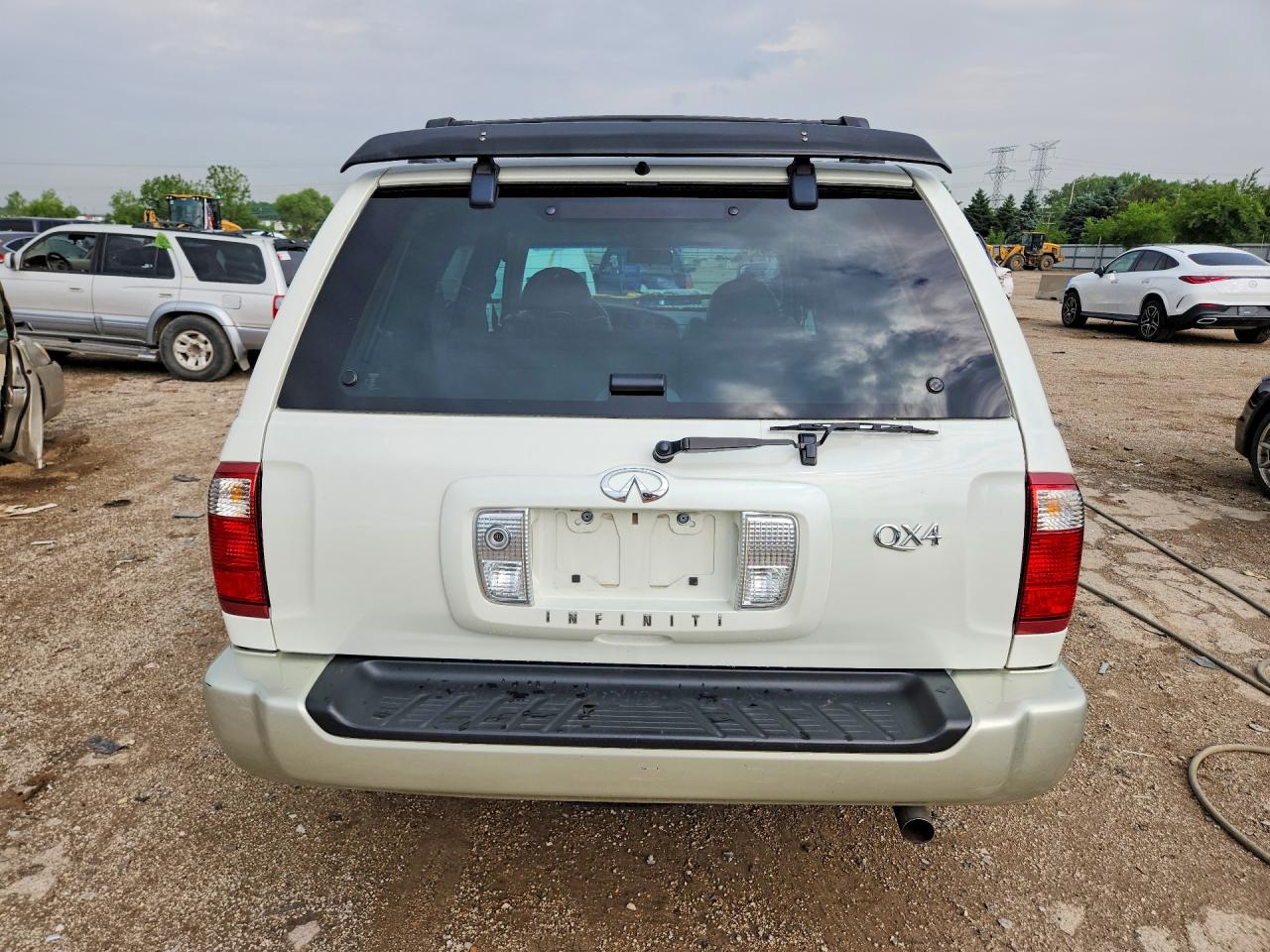 2002 Infiniti Qx4 Base Beige vin: JNRDR09YX2W254038