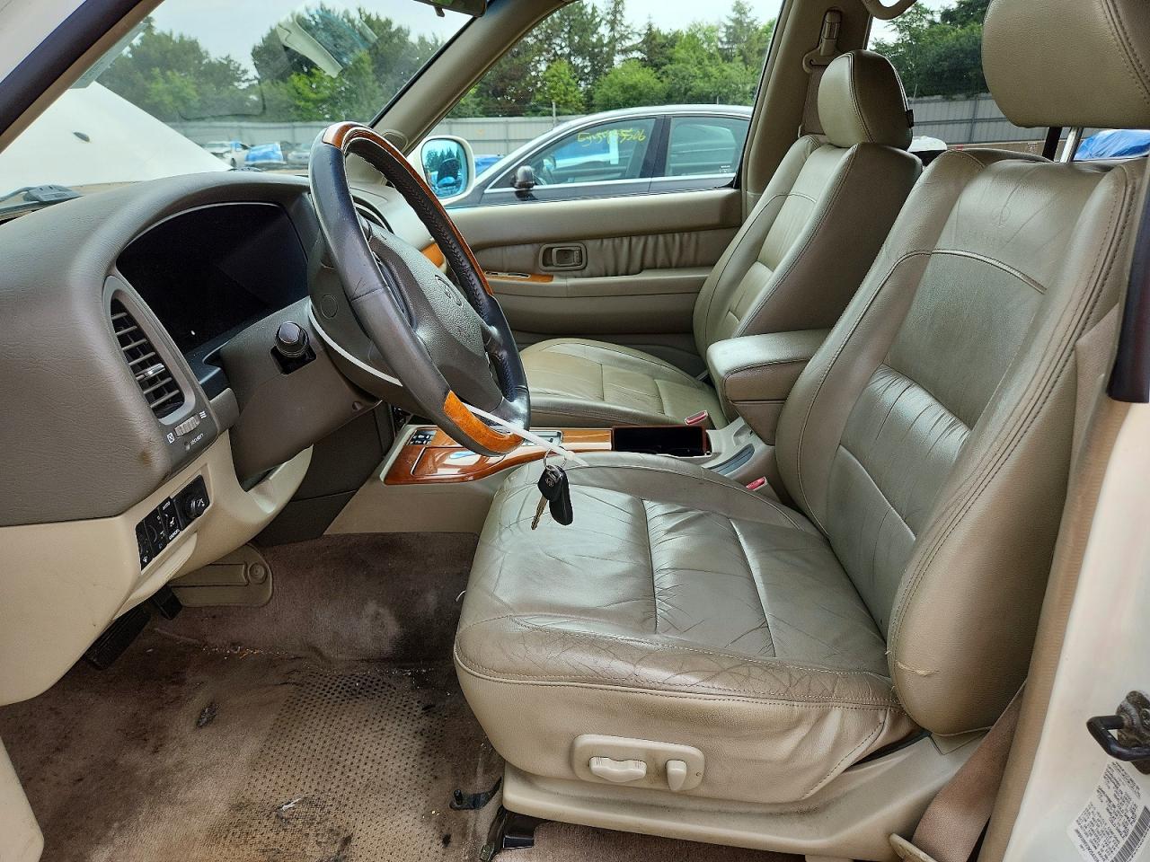 2002 Infiniti Qx4 Base Beige vin: JNRDR09YX2W254038