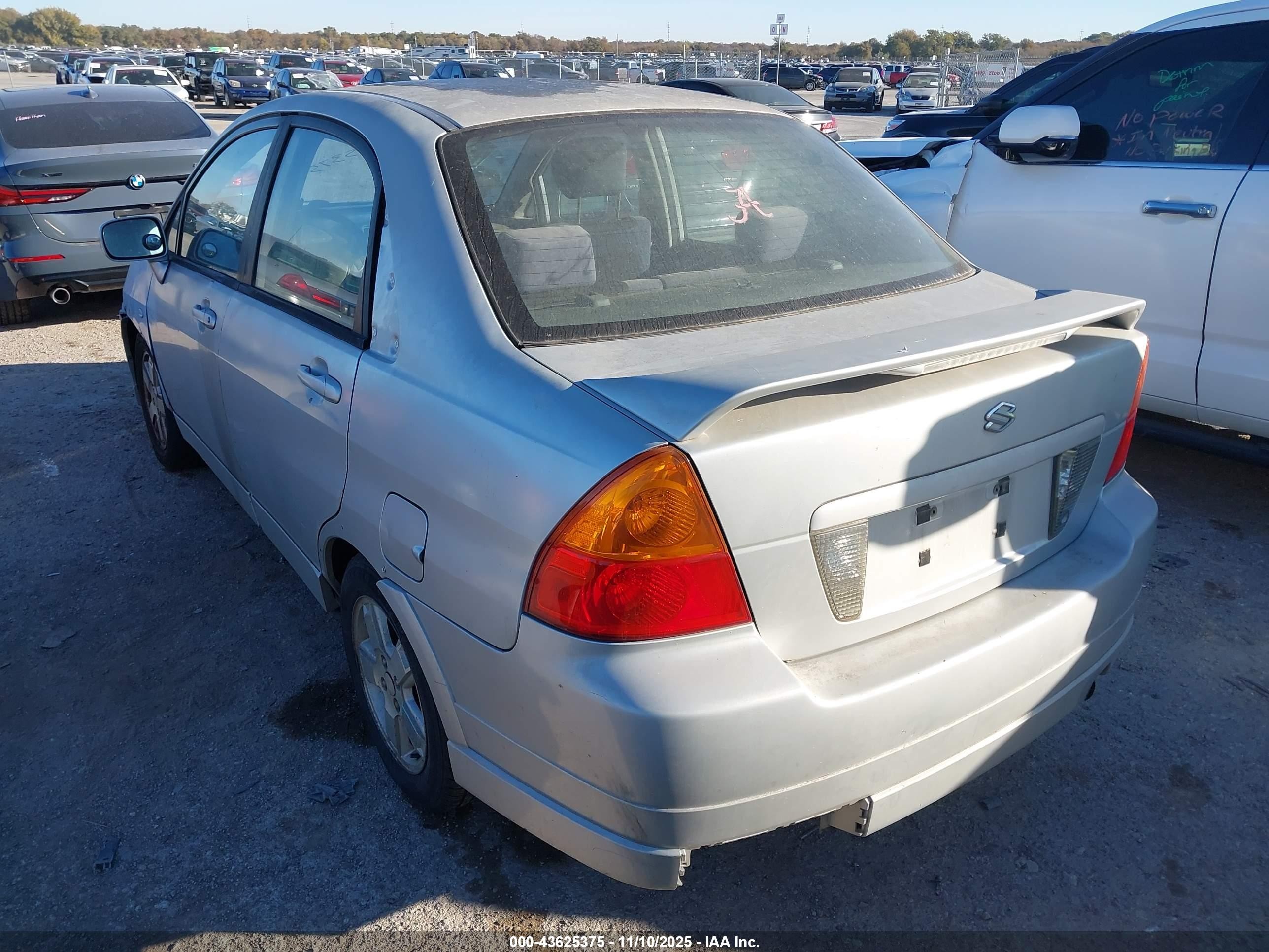 2002 Suzuki Aerio   Gray vin: JS2RA41S825104520