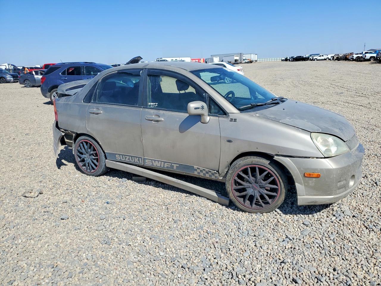 2004 Suzuki Aerio S Tan vin: JS2RA61S345201414