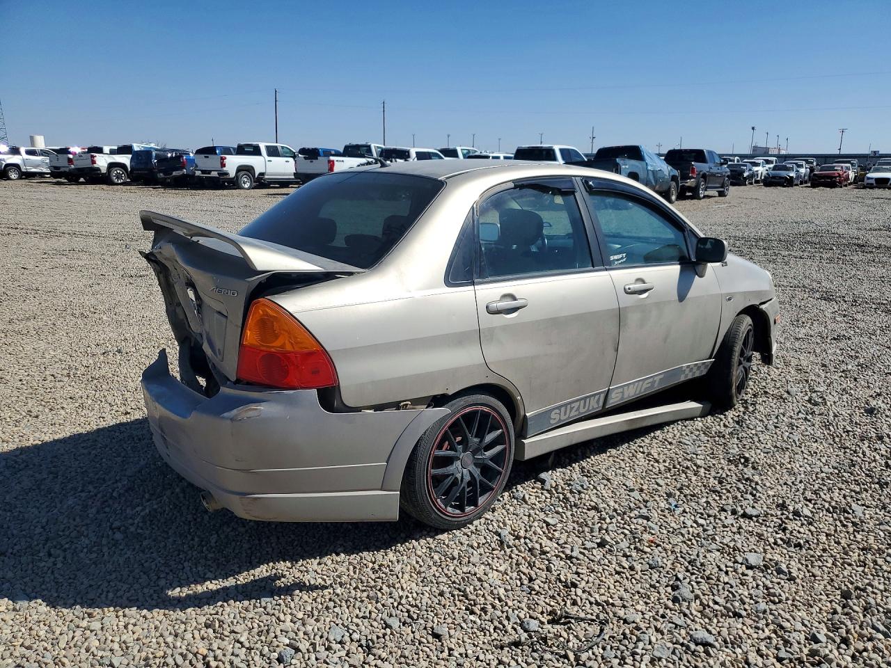 2004 Suzuki Aerio S Tan vin: JS2RA61S345201414