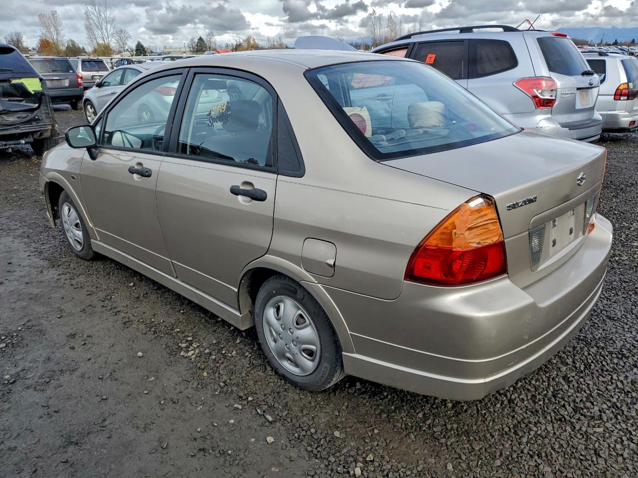 2004 Suzuki Aerio S Tan vin: JS2RA61S545203438