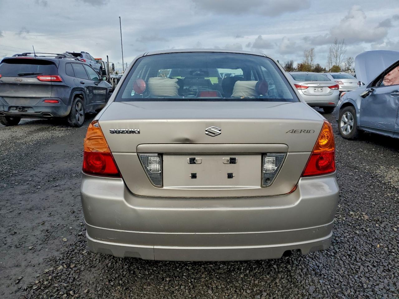 2004 Suzuki Aerio S Tan vin: JS2RA61S545203438