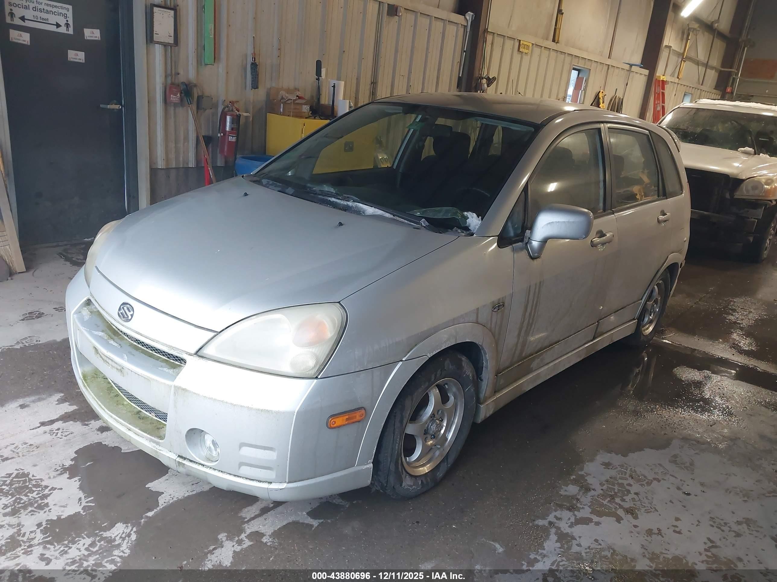 2003 Suzuki Aerio Sx   Silver vin: JS2RC41H435202086