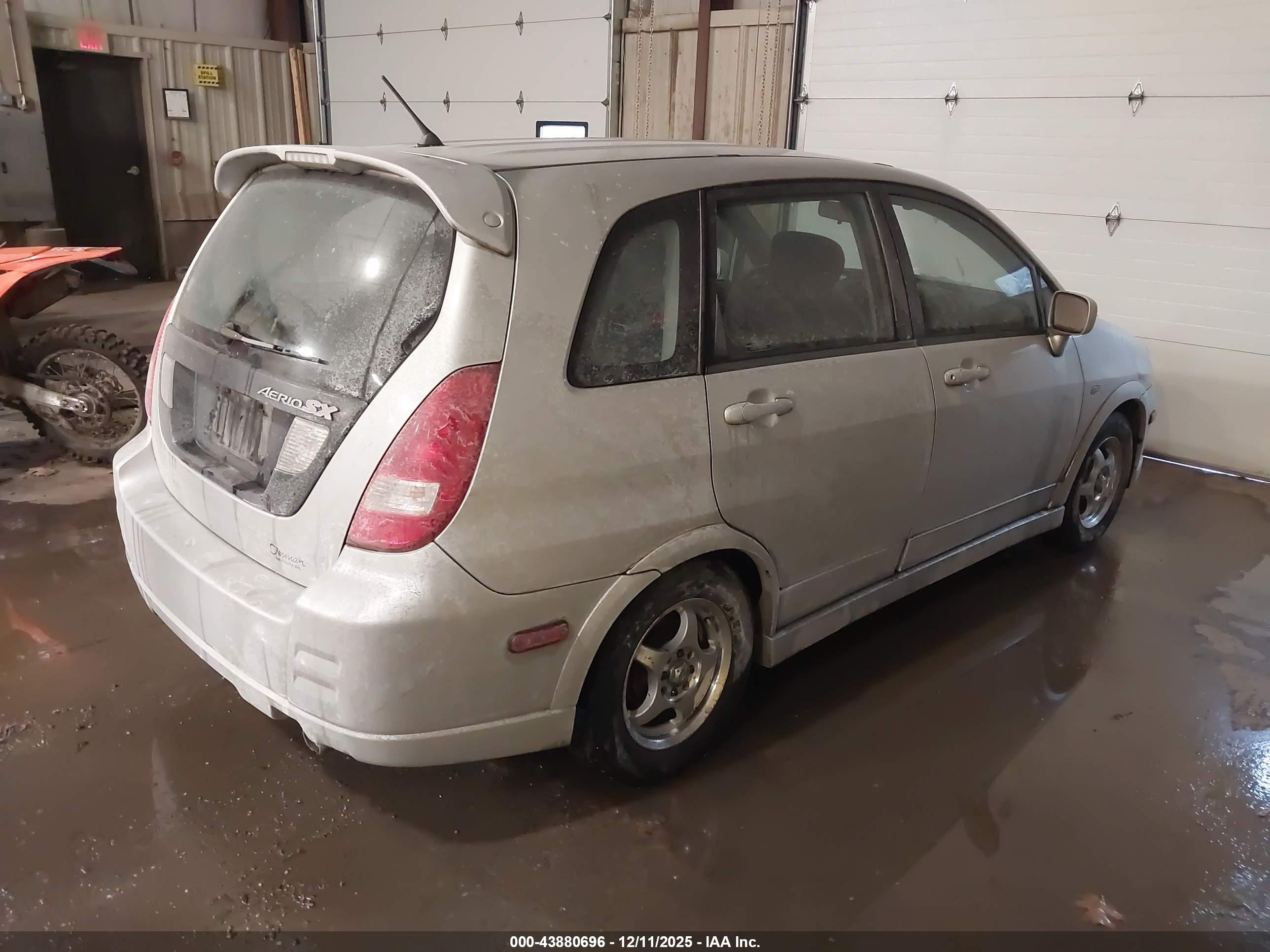 2003 Suzuki Aerio Sx   Silver vin: JS2RC41H435202086