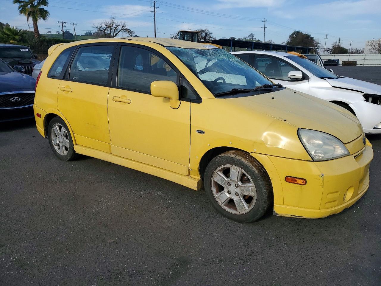 2002 Suzuki Aerio Sx Yellow vin: JS2RC41H725104412