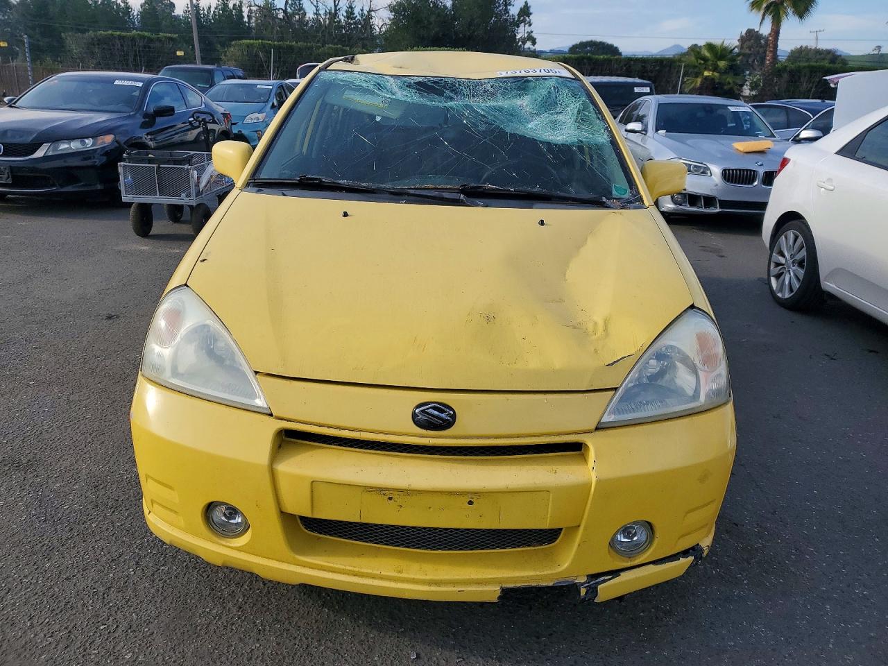 2002 Suzuki Aerio Sx Yellow vin: JS2RC41H725104412