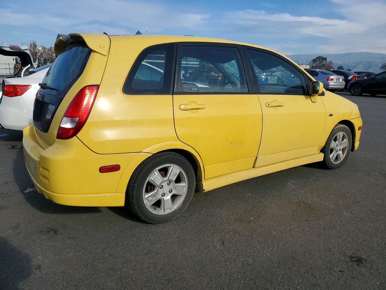 2002 Suzuki Aerio Sx Yellow vin: JS2RC41H725104412