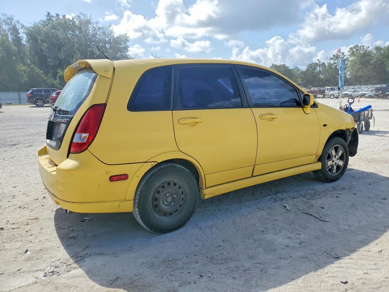 2002 Suzuki Aerio Sx Yellow vin: JS2RC41H925103049