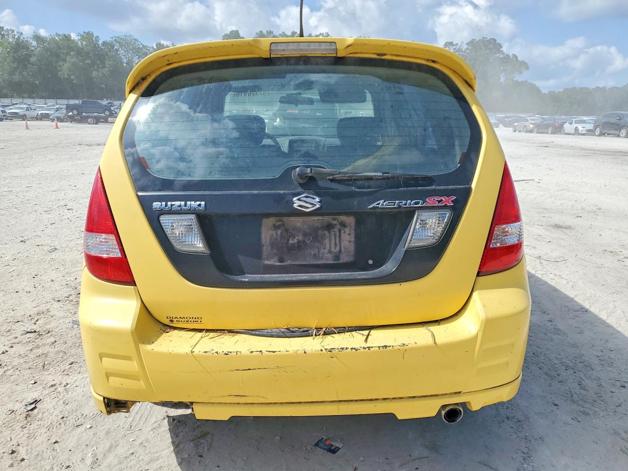 2002 Suzuki Aerio Sx Yellow vin: JS2RC41H925103049