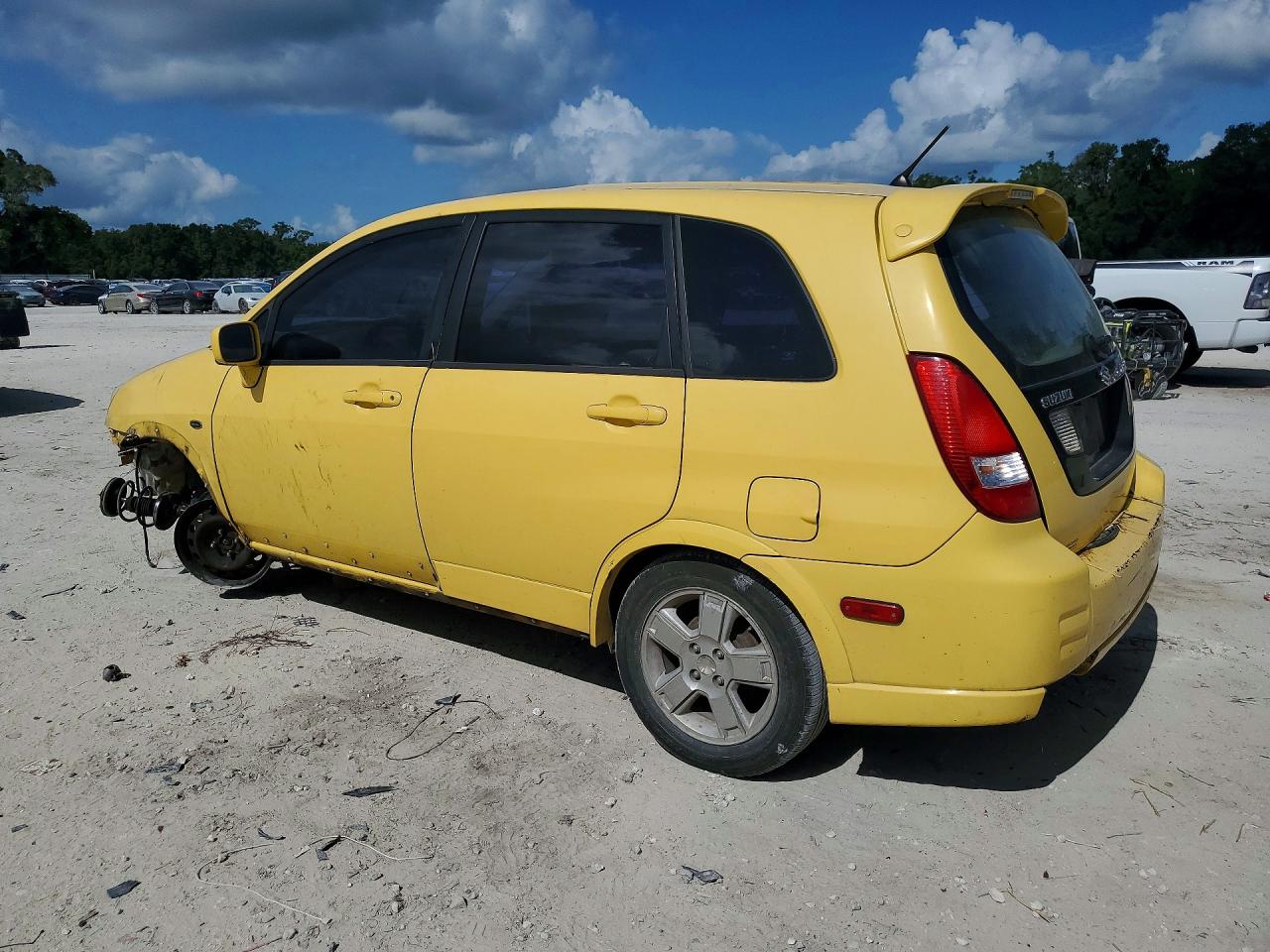 2002 Suzuki Aerio Sx Yellow vin: JS2RC41H925103049