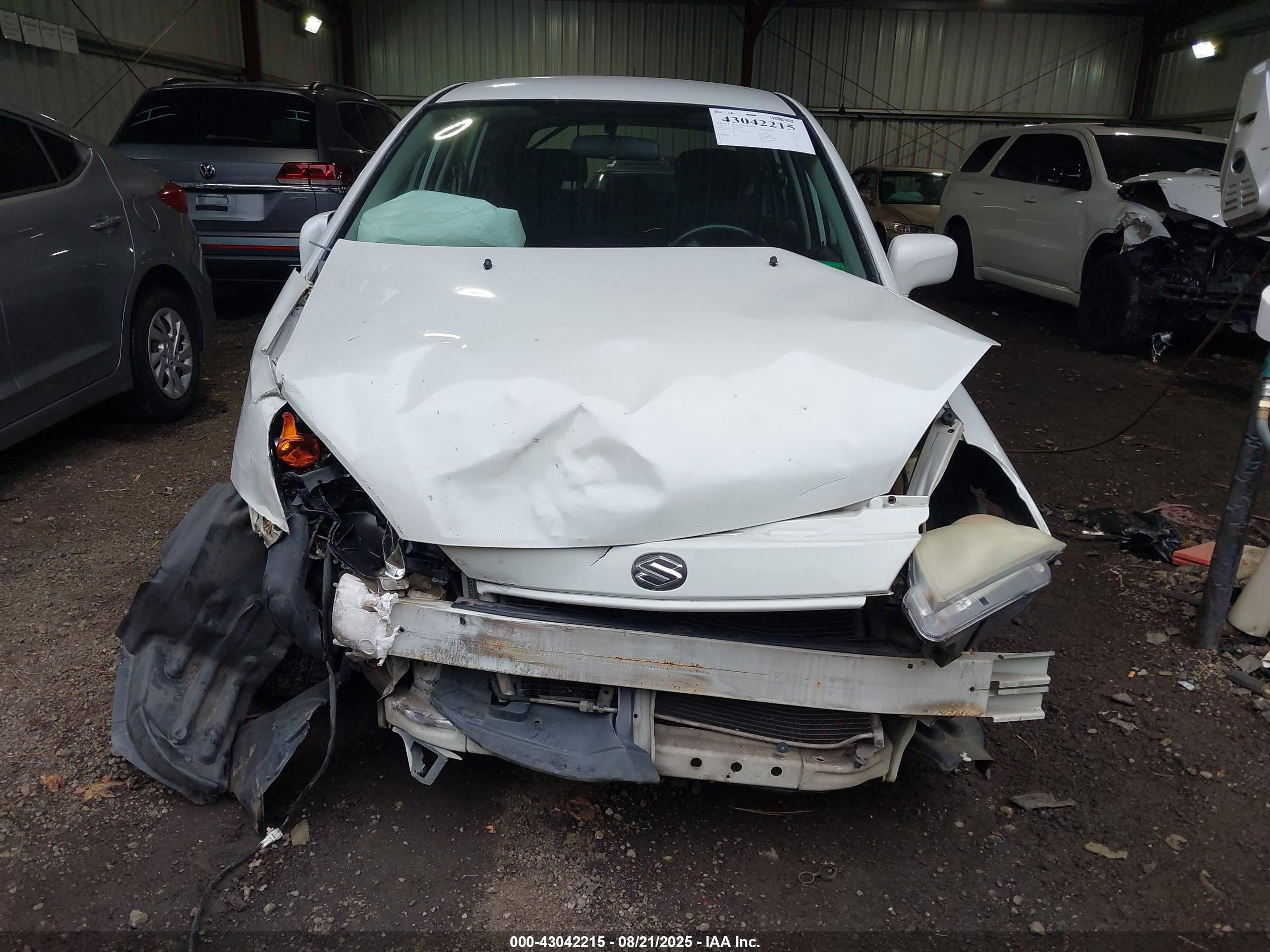 2003 Suzuki Aerio Sx   White vin: JS2RC41H935212287