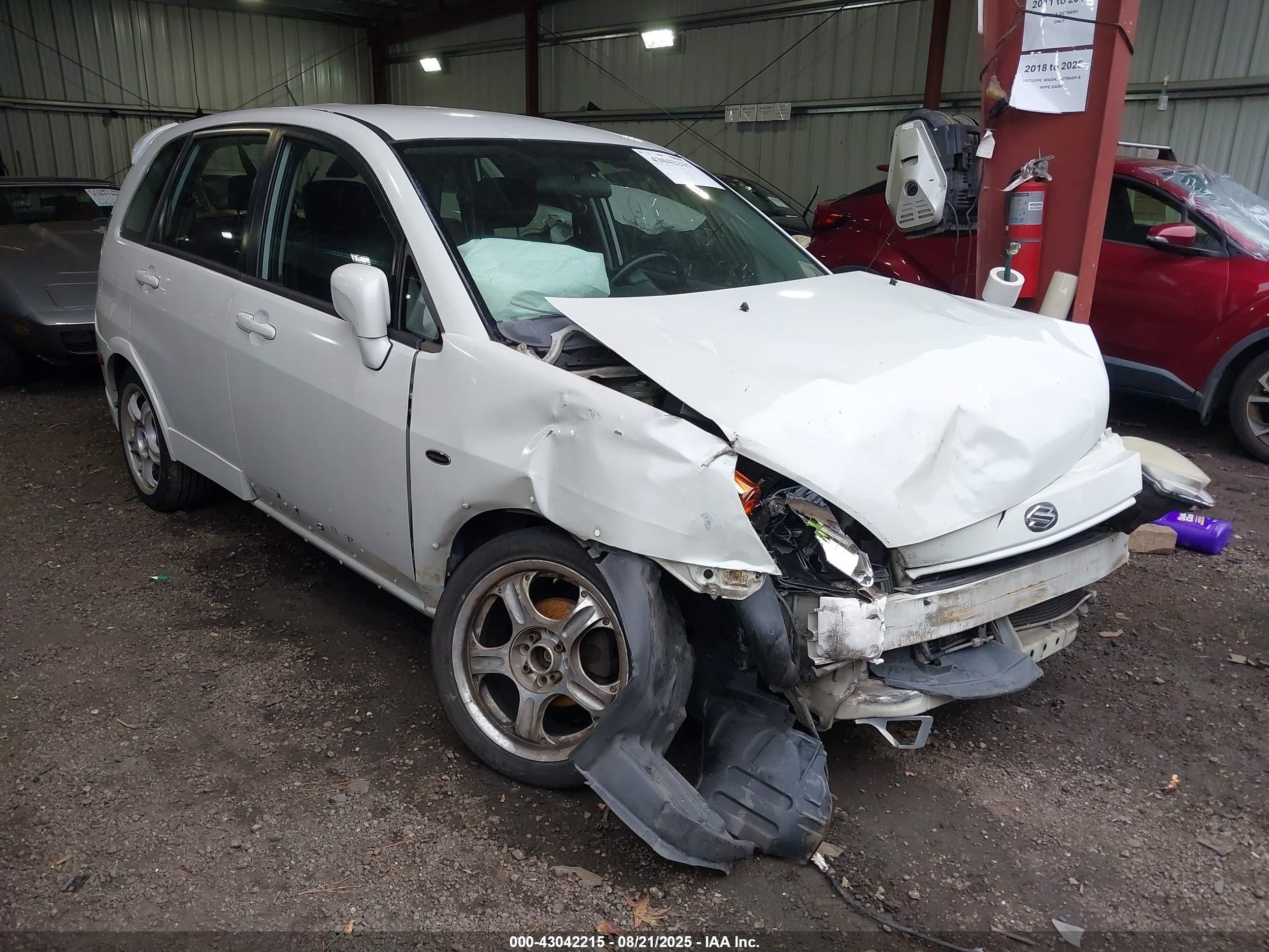 2003 Suzuki Aerio Sx   White vin: JS2RC41H935212287