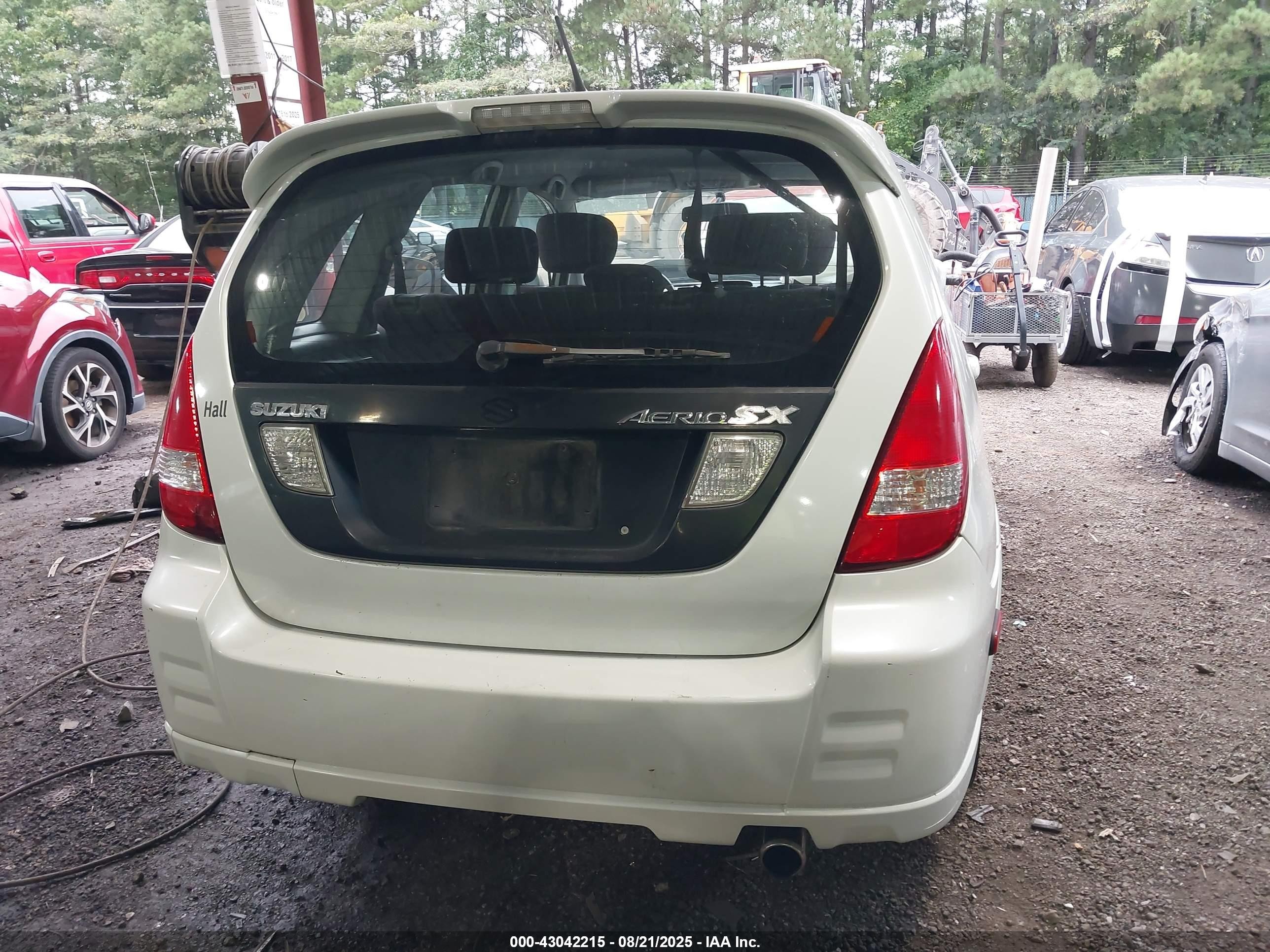 2003 Suzuki Aerio Sx   White vin: JS2RC41H935212287