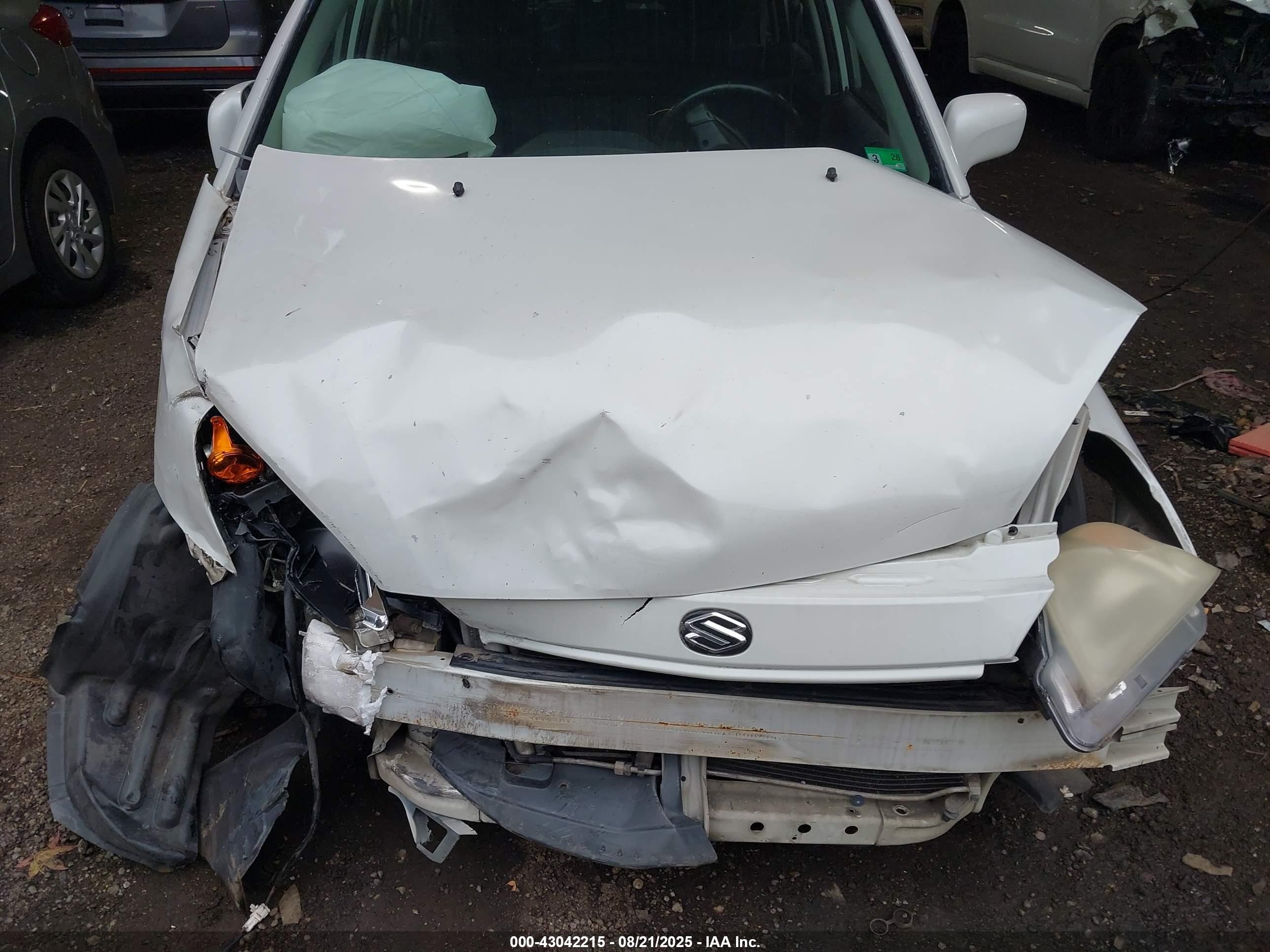 2003 Suzuki Aerio Sx   White vin: JS2RC41H935212287