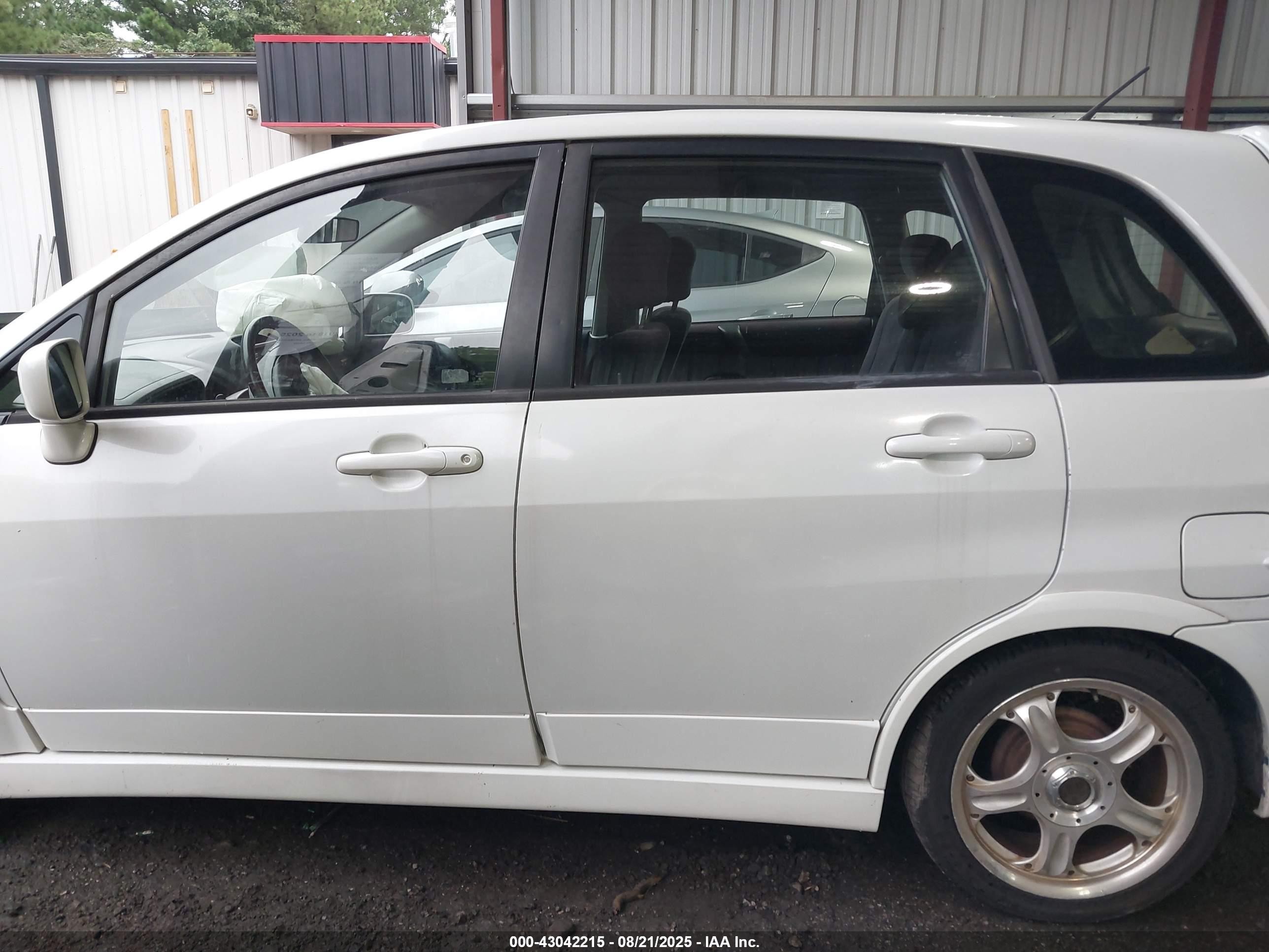 2003 Suzuki Aerio Sx   White vin: JS2RC41H935212287