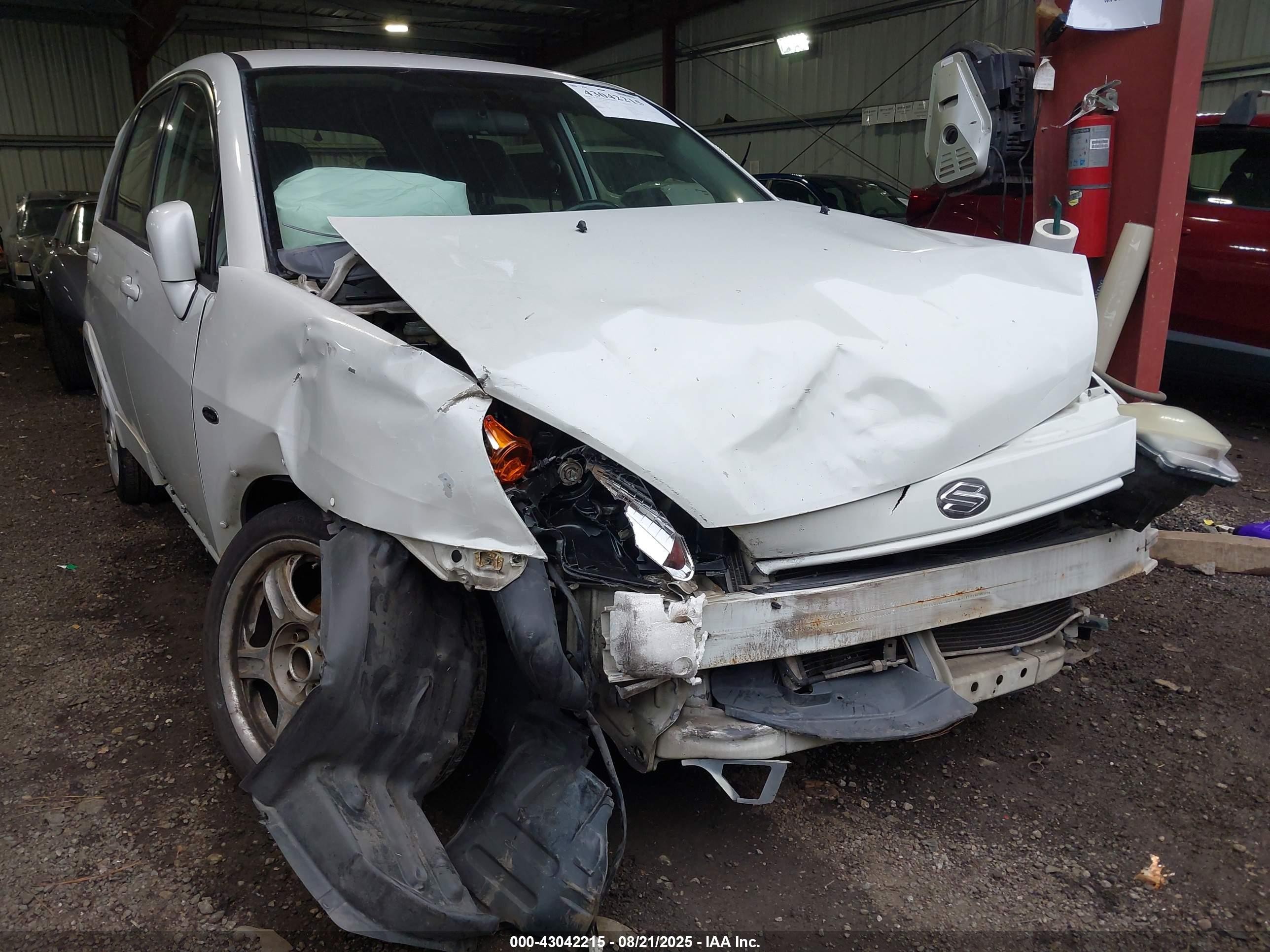 2003 Suzuki Aerio Sx   White vin: JS2RC41H935212287
