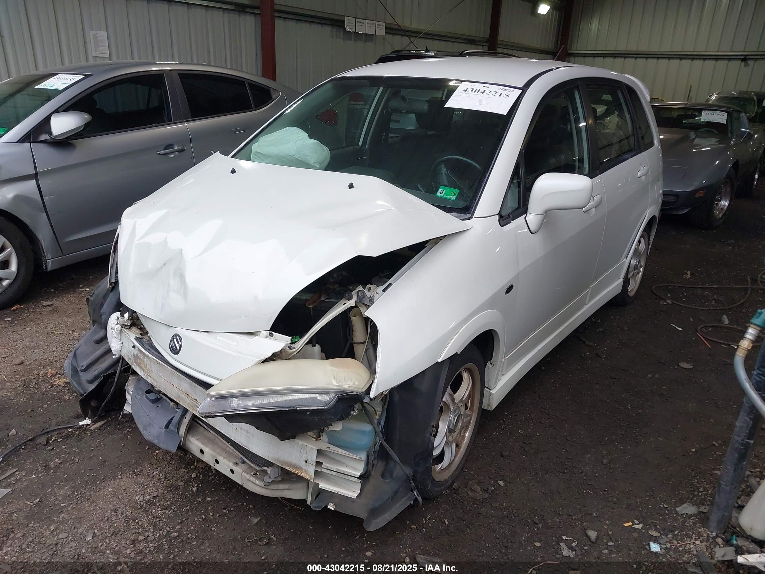 2003 Suzuki Aerio Sx   White vin: JS2RC41H935212287