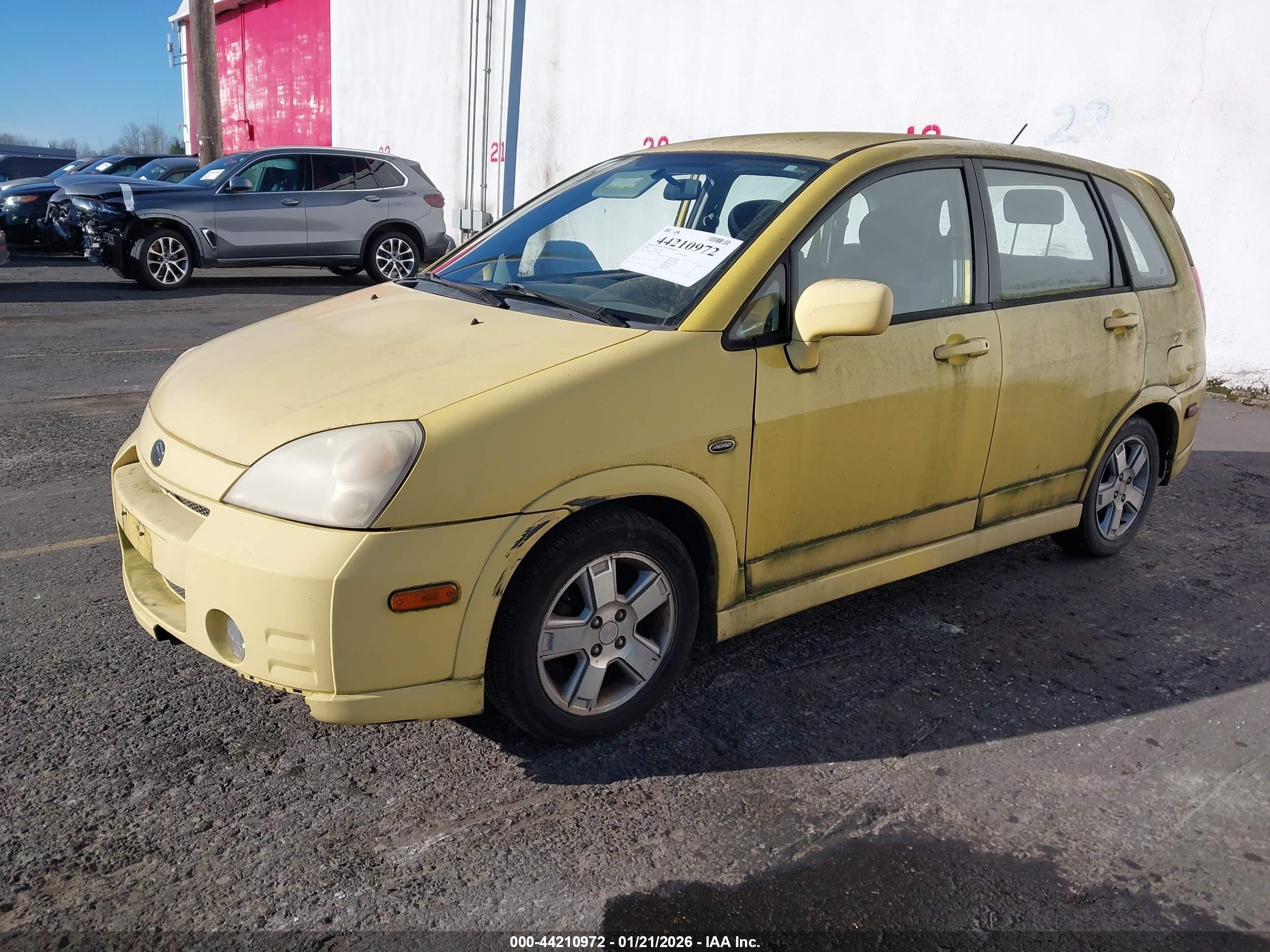 2003 Suzuki Aerio Sx   Yellow vin: JS2RC41HX35203128