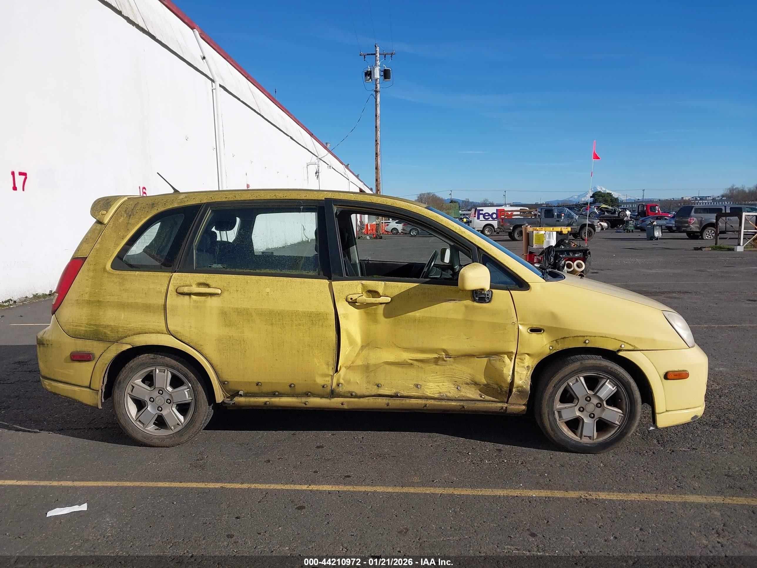 2003 Suzuki Aerio Sx   Yellow vin: JS2RC41HX35203128