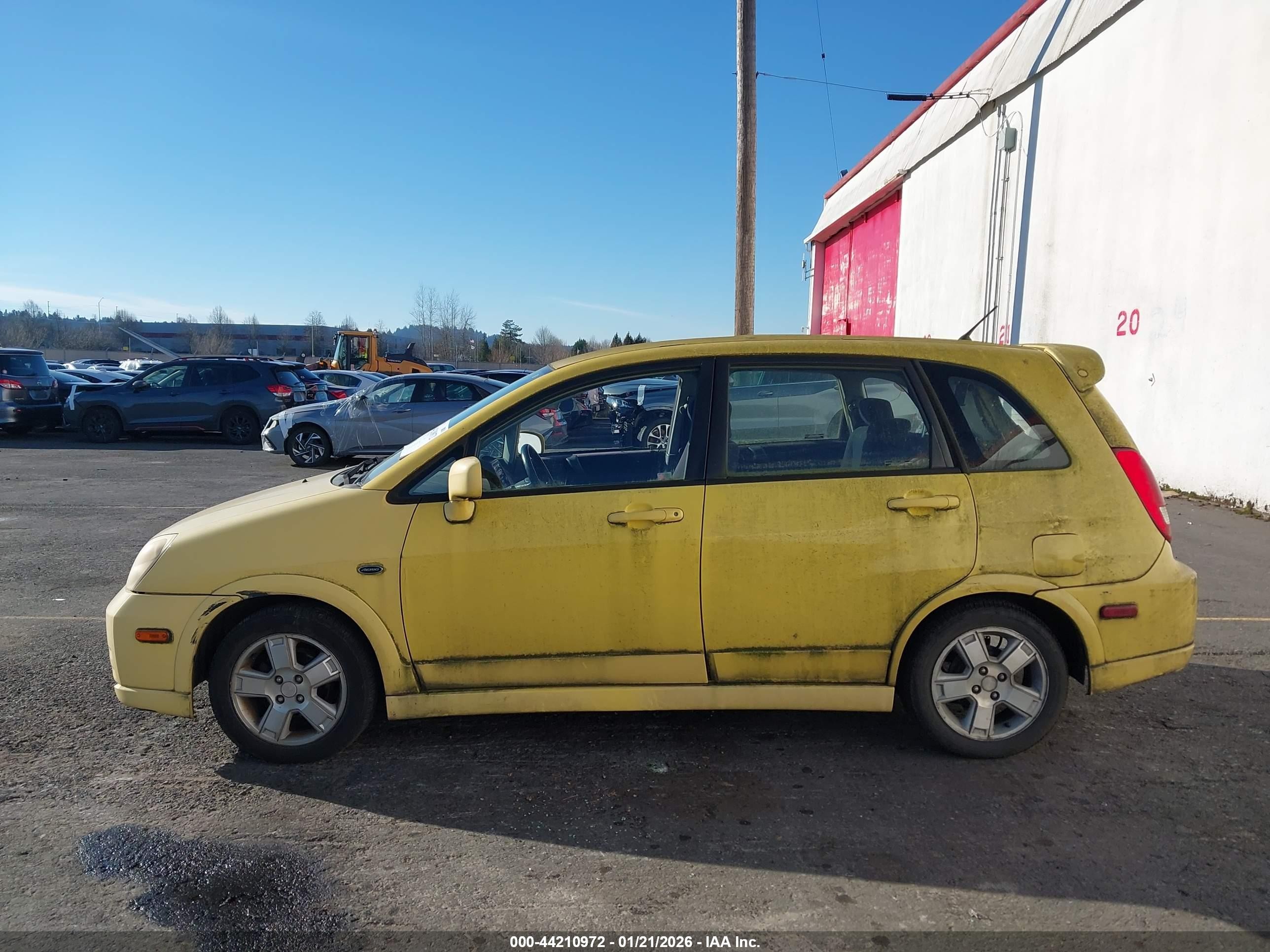 2003 Suzuki Aerio Sx   Yellow vin: JS2RC41HX35203128