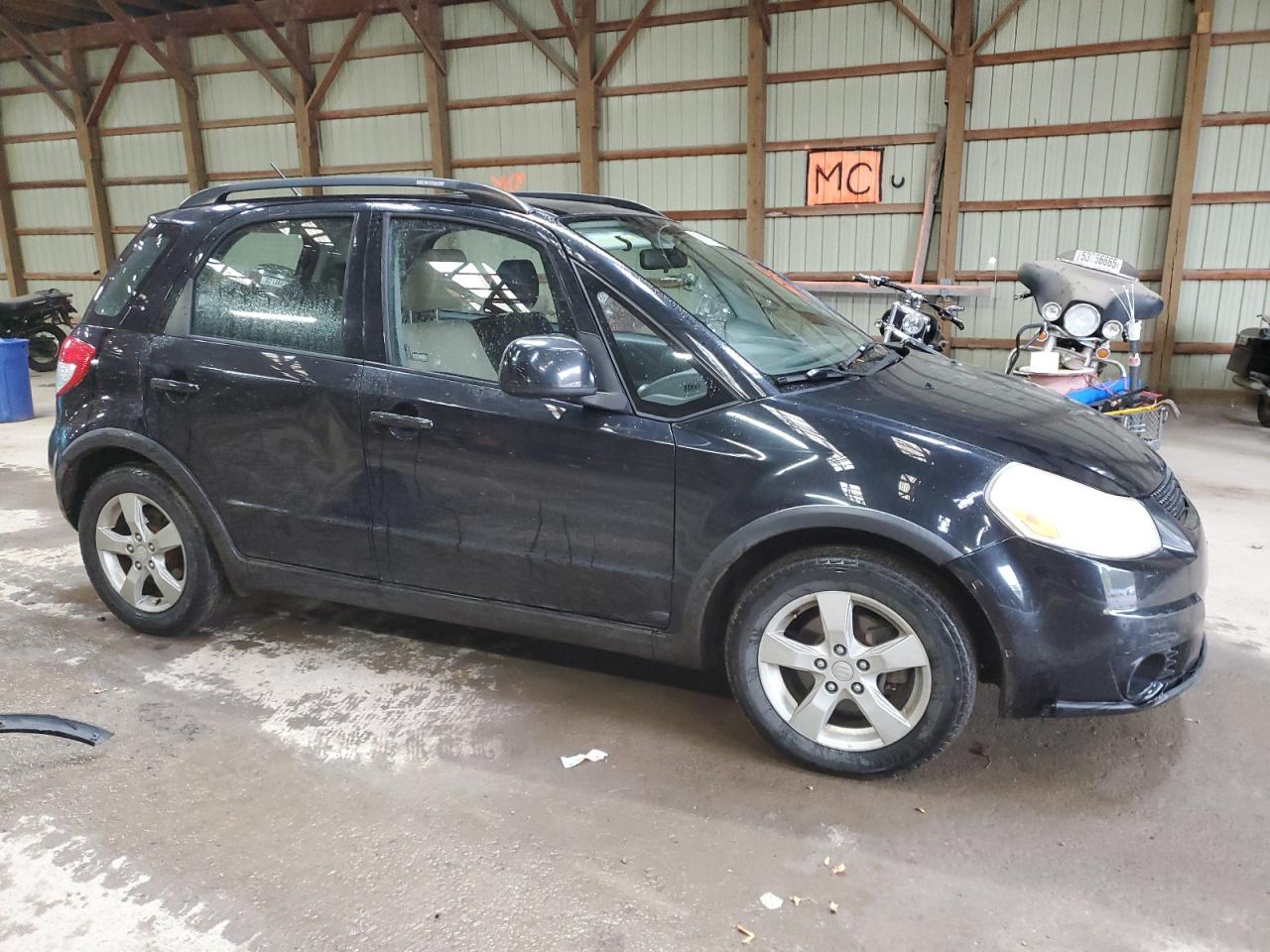 2010 Suzuki Sx4 Jx Black vin: JS2YA5A29A6300301