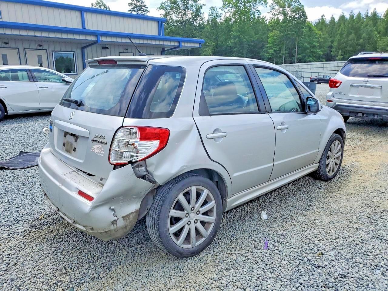 2012 Suzuki Sx4 Silver vin: JS2YA5A51C6300029