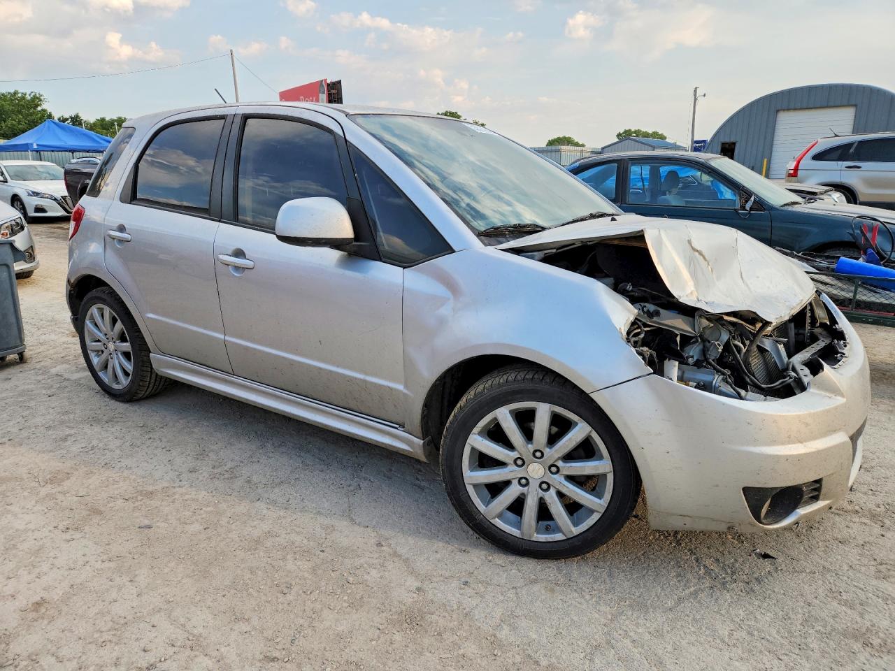 2012 Suzuki Sx4 Silver vin: JS2YA5A52C6300444