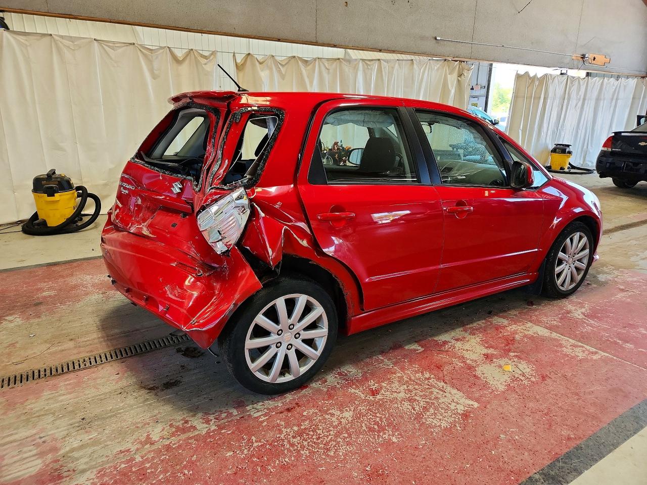 2011 Suzuki Sx4 Red vin: JS2YA5A58B6300172
