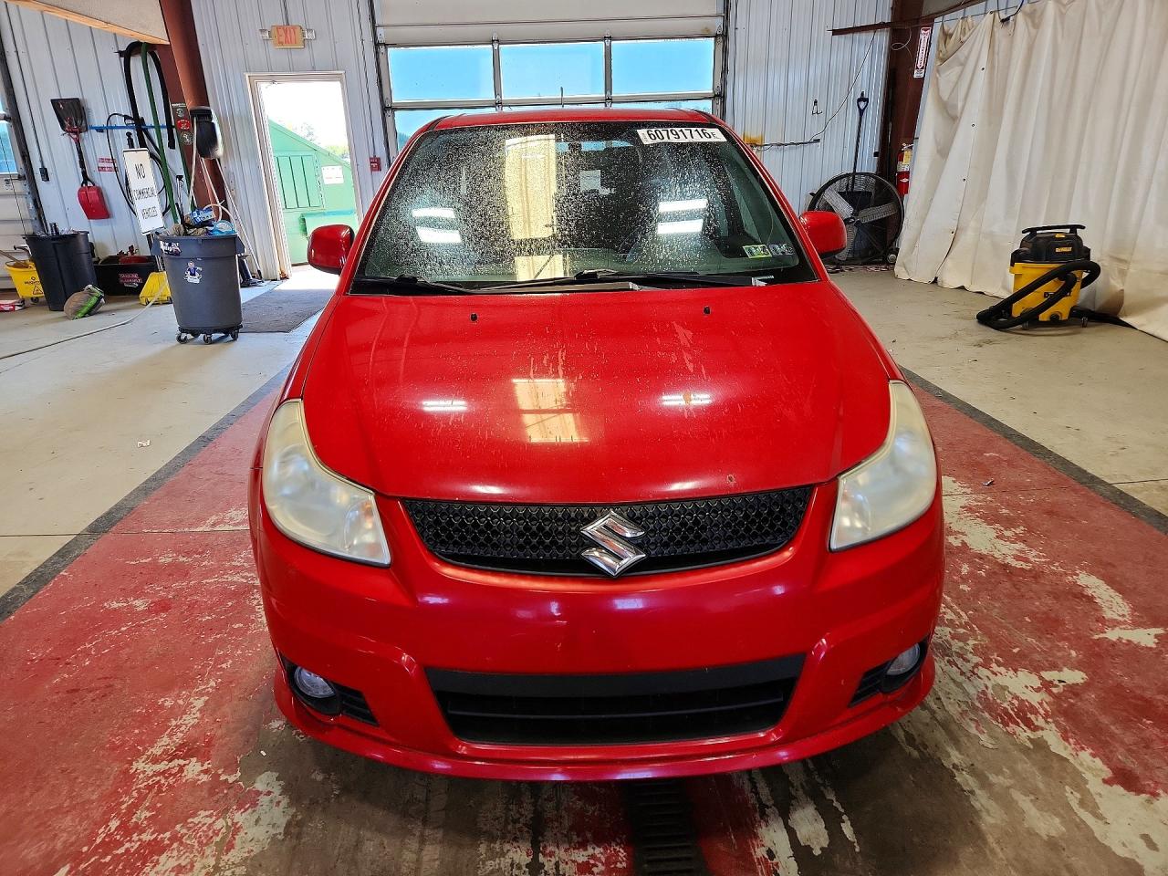 2011 Suzuki Sx4 Red vin: JS2YA5A58B6300172