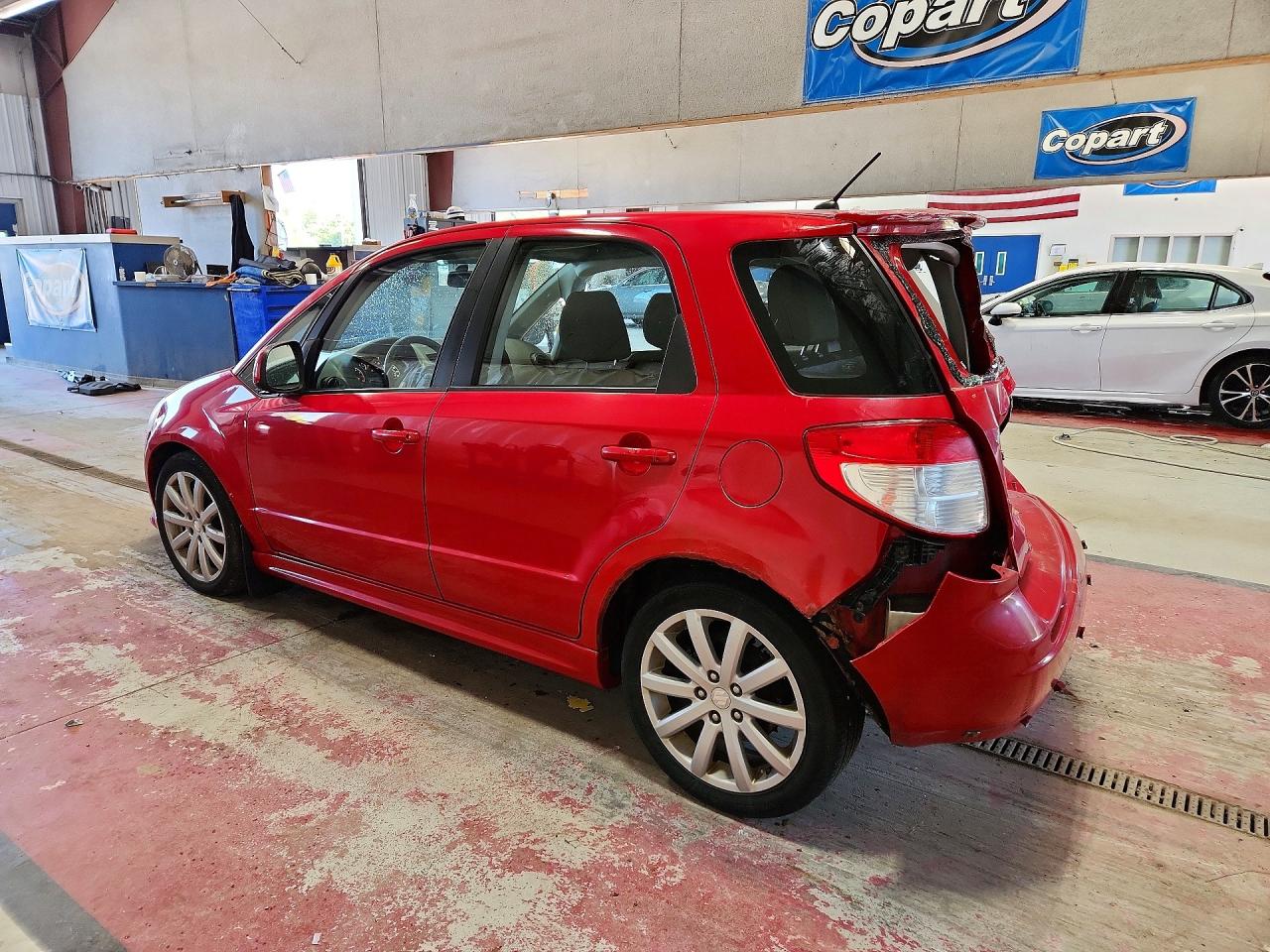 2011 Suzuki Sx4 Red vin: JS2YA5A58B6300172