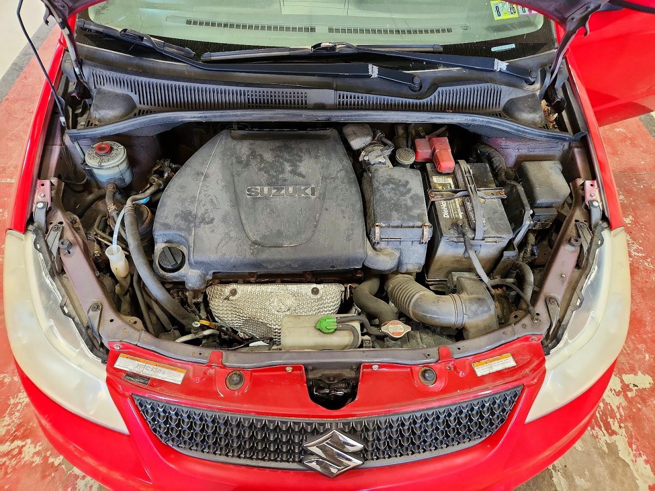 2011 Suzuki Sx4 Red vin: JS2YA5A58B6300172