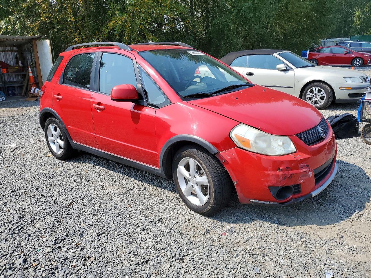 2009 Suzuki Sx4 Technology Red vin: JS2YB413X96202843