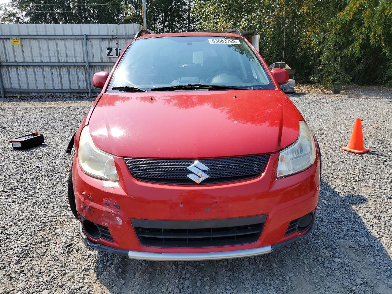 2009 Suzuki Sx4 Technology Red vin: JS2YB413X96202843