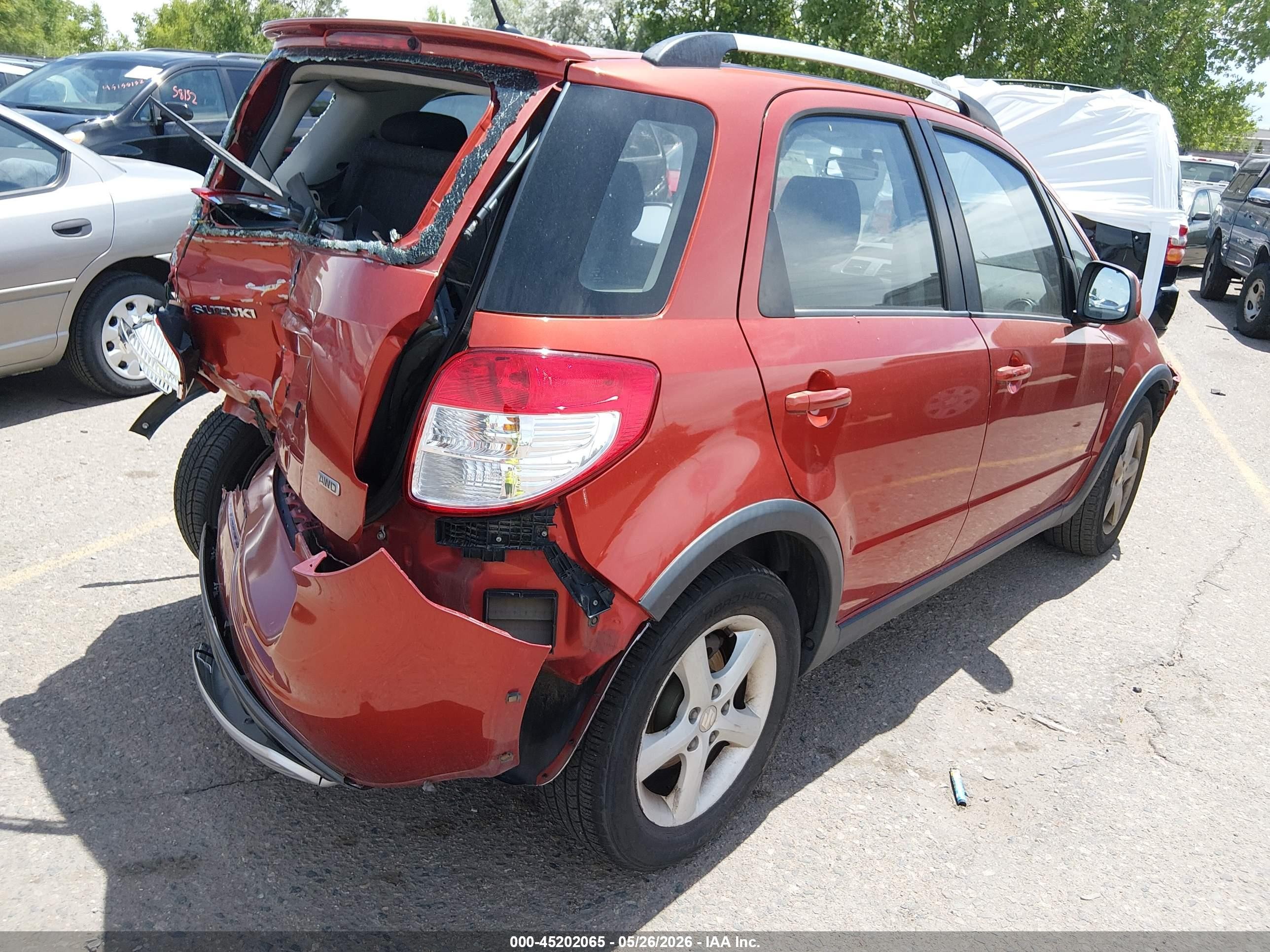 2009 Suzuki Sx4 Touring Orange vin: JS2YB417695100996