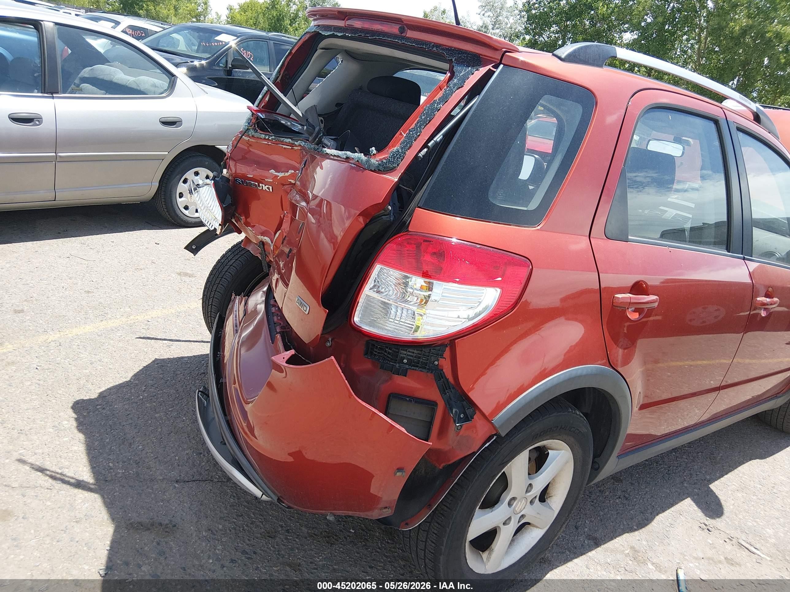 2009 Suzuki Sx4 Touring Orange vin: JS2YB417695100996