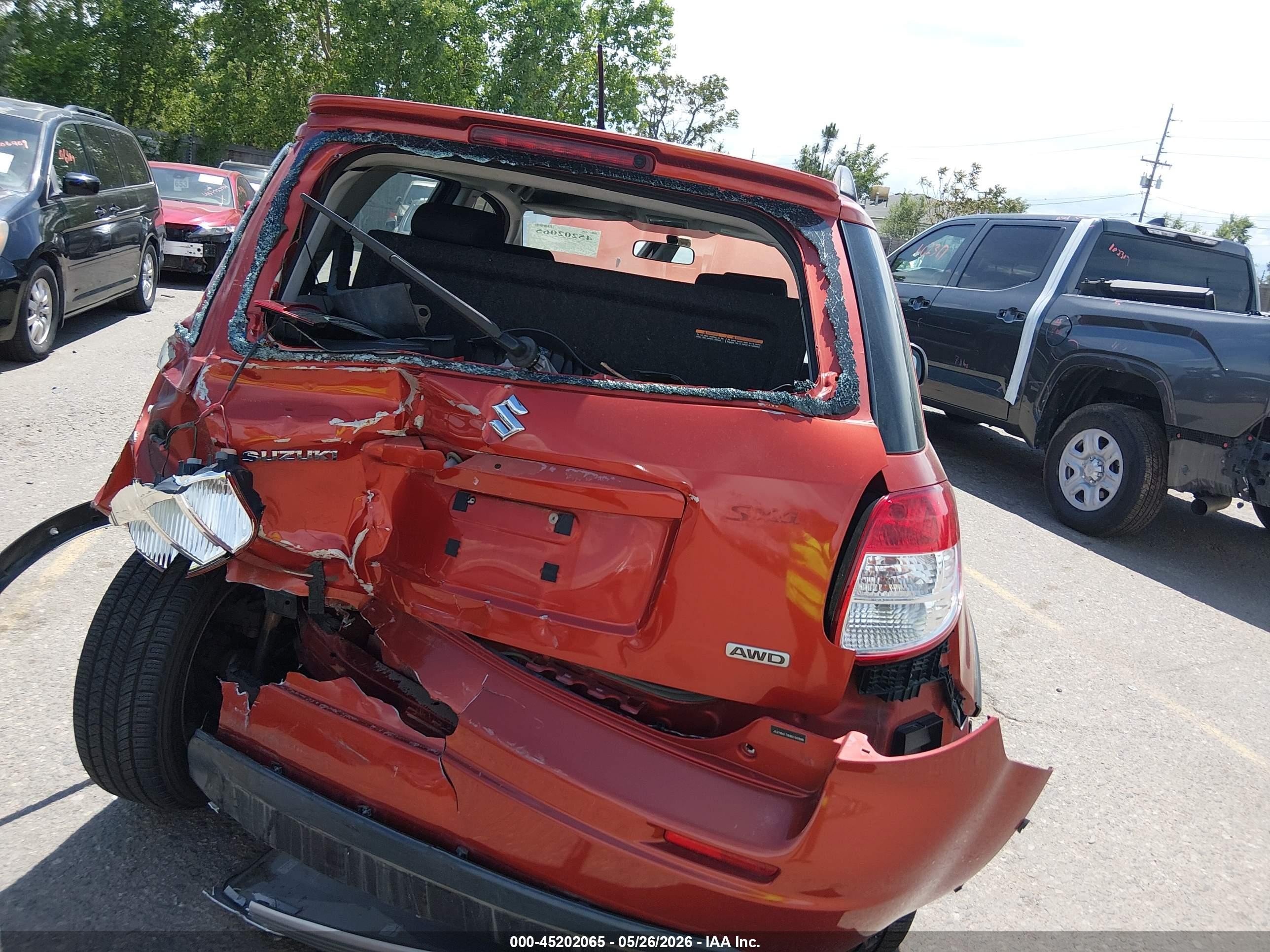 2009 Suzuki Sx4 Touring Orange vin: JS2YB417695100996