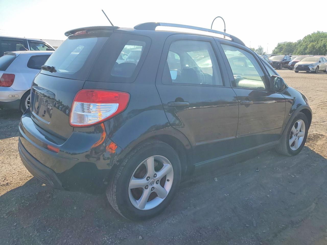 2009 Suzuki Sx4 Touring Black vin: JS2YB417895100854