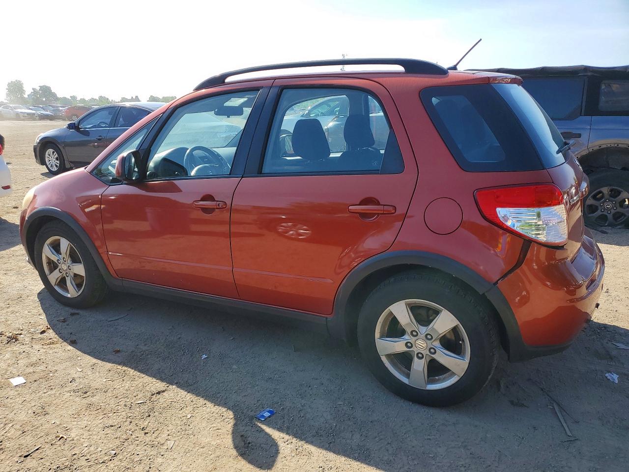 2011 Suzuki Sx4 Jx Orange vin: JS2YB5A23B6300891