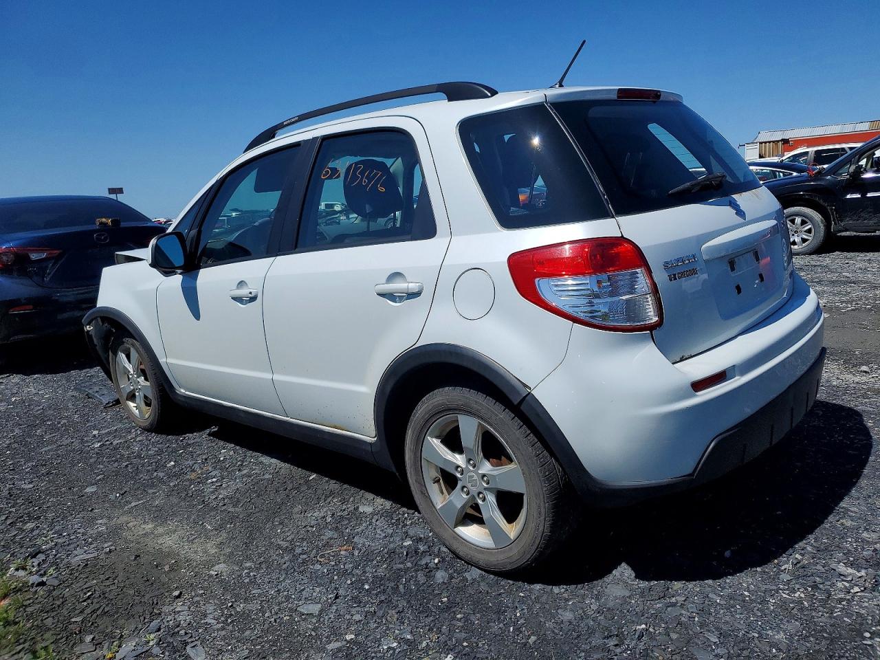 2010 Suzuki Sx4 Jx White vin: JS2YB5A27A6310497
