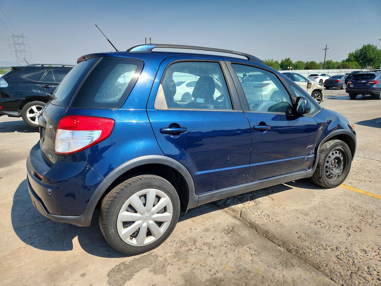 2011 Suzuki Sx4 Blue vin: JS2YB5A30B6300954