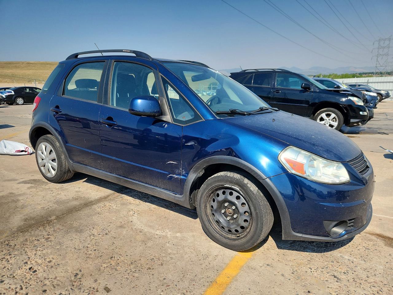 2011 Suzuki Sx4 Blue vin: JS2YB5A30B6300954