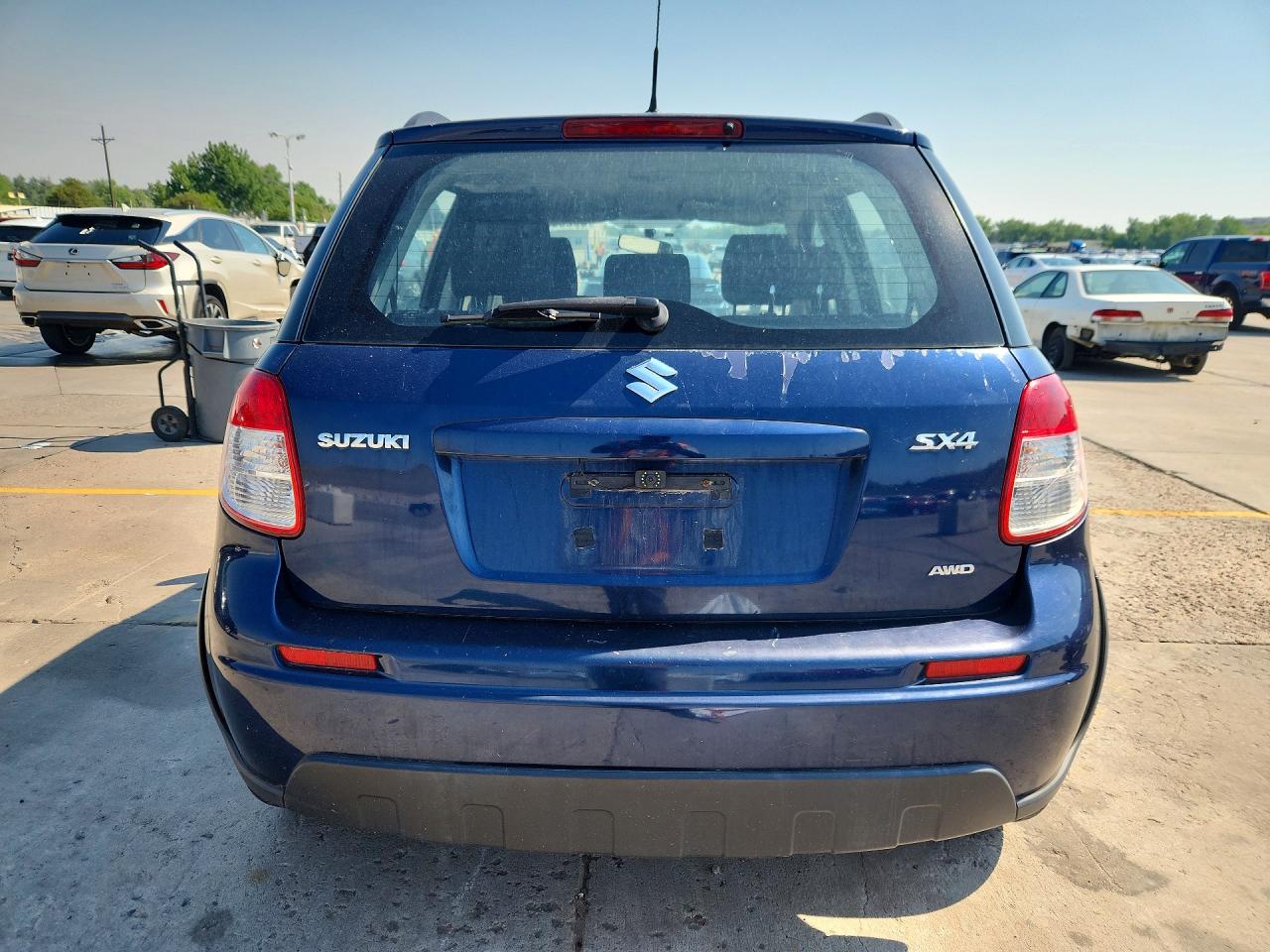 2011 Suzuki Sx4 Blue vin: JS2YB5A30B6300954