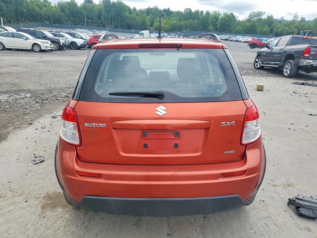 2011 Suzuki Sx4 Orange vin: JS2YB5A30B6301473
