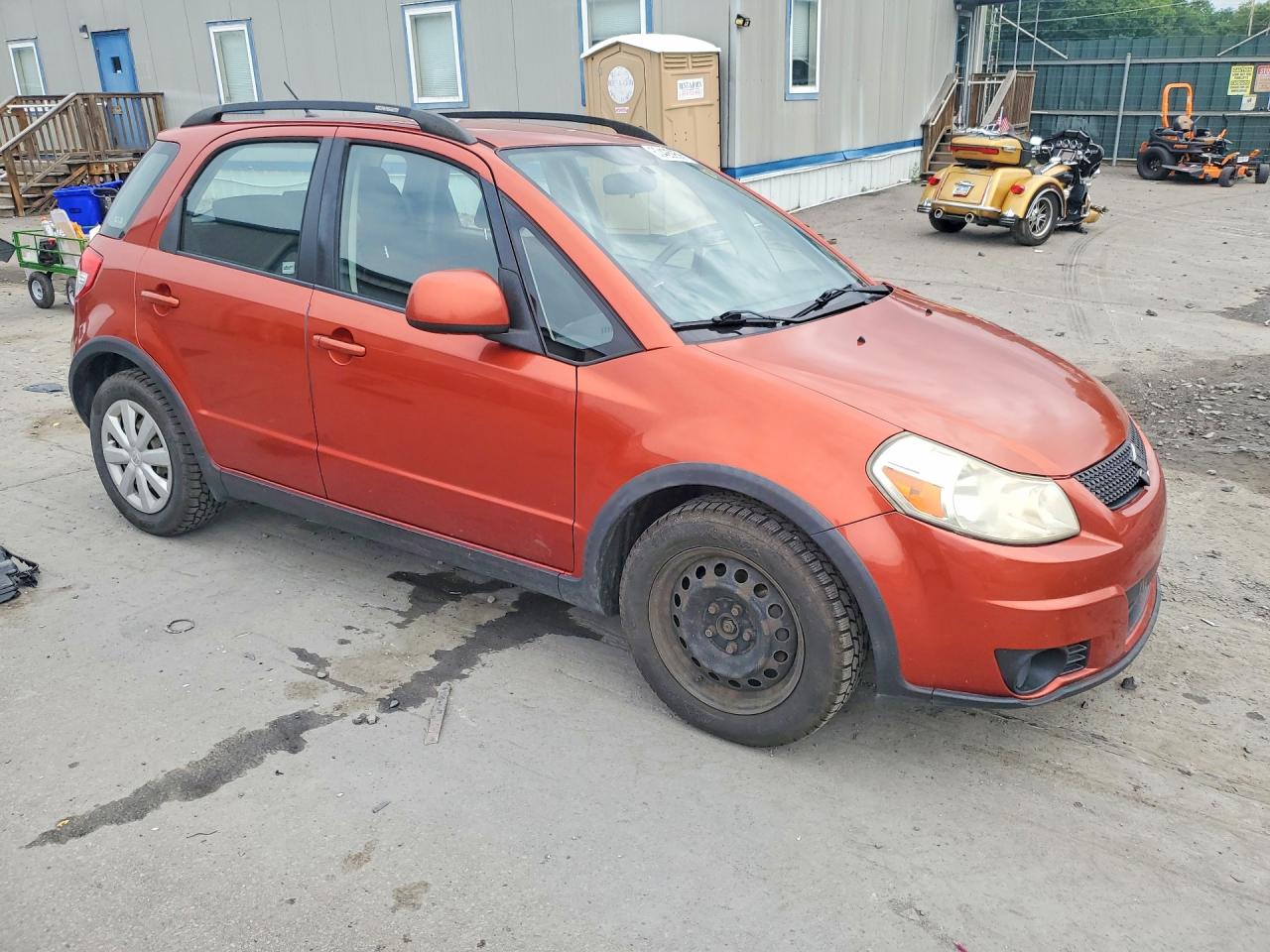 2011 Suzuki Sx4 Orange vin: JS2YB5A30B6301473