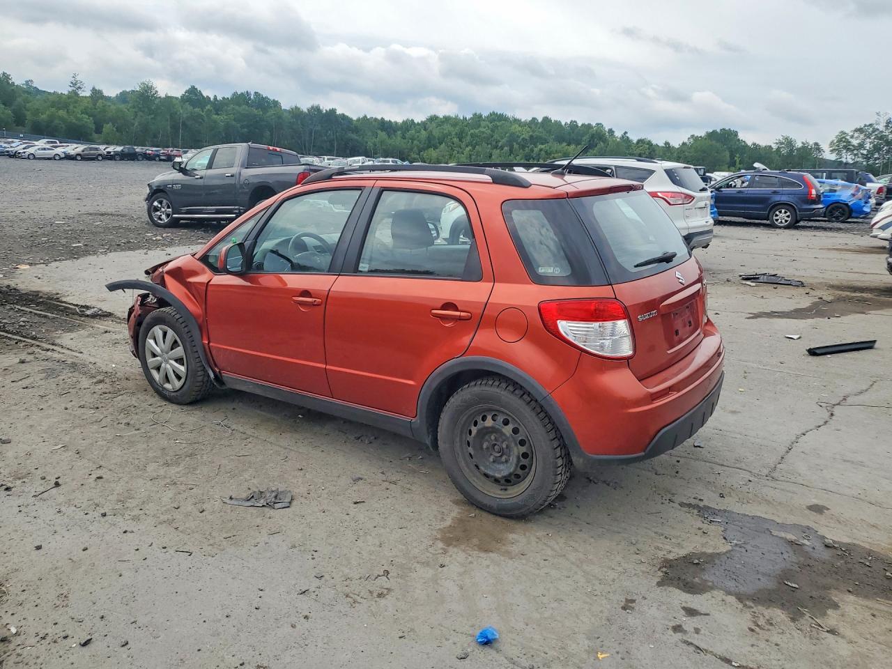 2011 Suzuki Sx4 Orange vin: JS2YB5A30B6301473